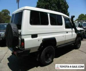 Item 2002 Toyota Landcruiser HZJ78R (4x4) 3 Seat White Manual 5sp M TroopCarrier for Sale