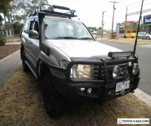 Item 2003 Toyota Landcruiser UZJ100R GXL (4x4) Gold Manual 5sp M Wagon for Sale