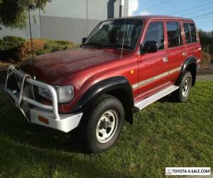 Item 1998 Toyota Landcruiser FZJ105R GXL (4x4) Red Automatic 4sp A Wagon for Sale