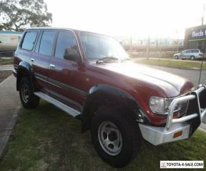 Item 1998 Toyota Landcruiser FZJ105R GXL (4x4) Red Automatic 4sp A Wagon for Sale